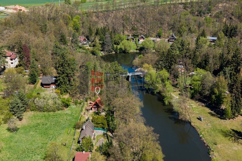 Prodej chaty s vlastním pozemkem v chatové oblasti u obce Plav.